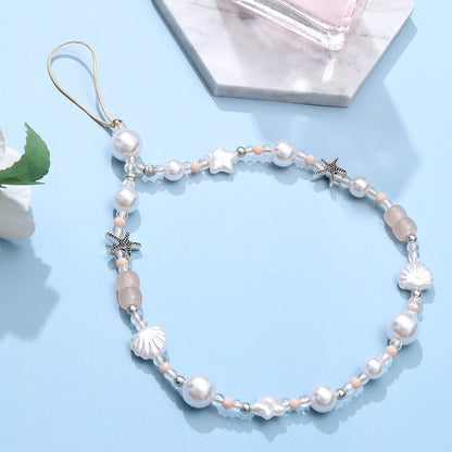 Casemania Universele Telefoonketting - Oceaan Design - Wristlet Charm Strap - Polsband met Parels, Zeesterren en Schelpen - Stevige Mobiele Armband
